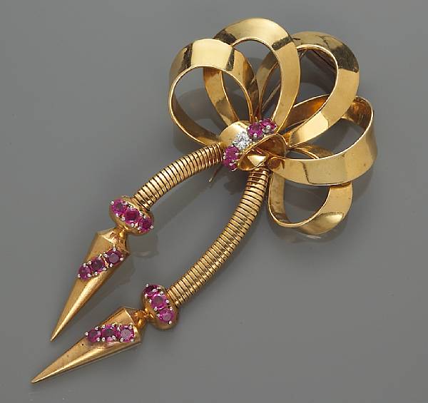 Appraisal: A retro ruby and diamond clip-brooch weighing approximately grams mounted