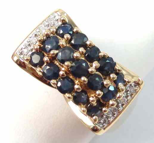 Appraisal: SAPPHIRE DIAMOND AND YELLOW GOLD RING k gold set with