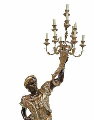 Appraisal: Venetian Blackamoor ten-light torchiere th c gold and silver gilt