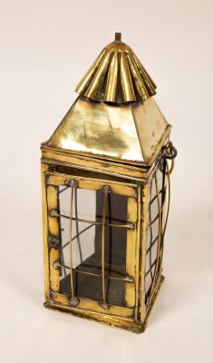 Appraisal: A brass lantern with glazed sides cm high and two