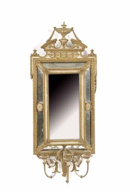 Appraisal: A th century giltwood and cream painted girandole with a