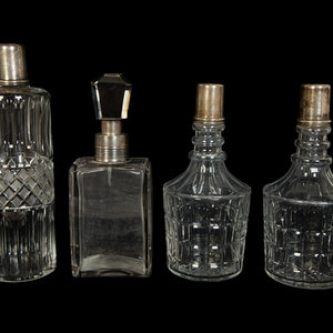 Appraisal: Four American Silver Mounted Cut Glass Decanters Early th Century