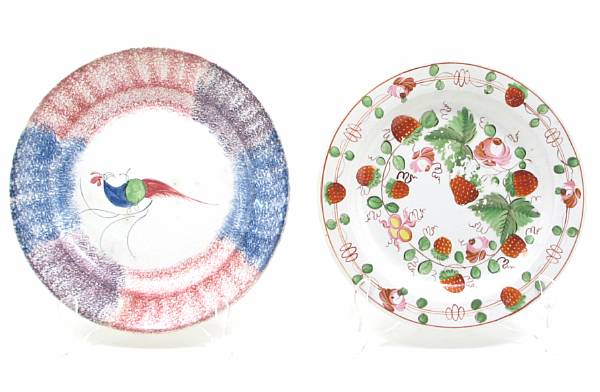 Appraisal: A Spatterware platter with peafowl together with a strawberry painted