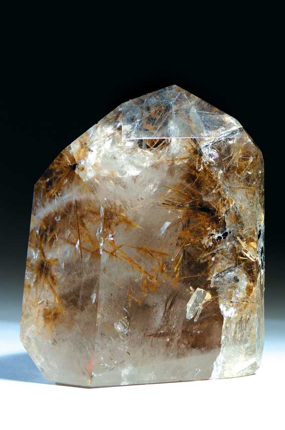 Appraisal: POLISHED QUARTZ WITH TOURMALINE RUTILE NEEDLES Brazil This polished crystal