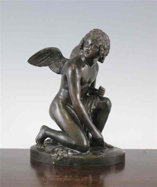 Appraisal: A th century French bronze figure of cupid on an