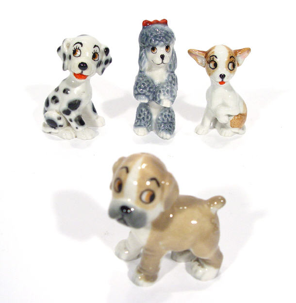 Appraisal: Four hand painted Bengo and His Puppy Friends characters -