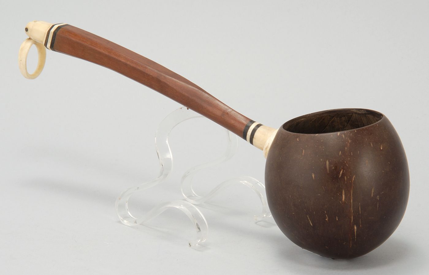 Appraisal: COCONUT SHELL DIPPER th CenturyMahogany handle with whale ivory and