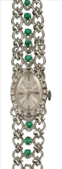 Appraisal: Omega a lady's carat white gold emerald and diamond bracelet