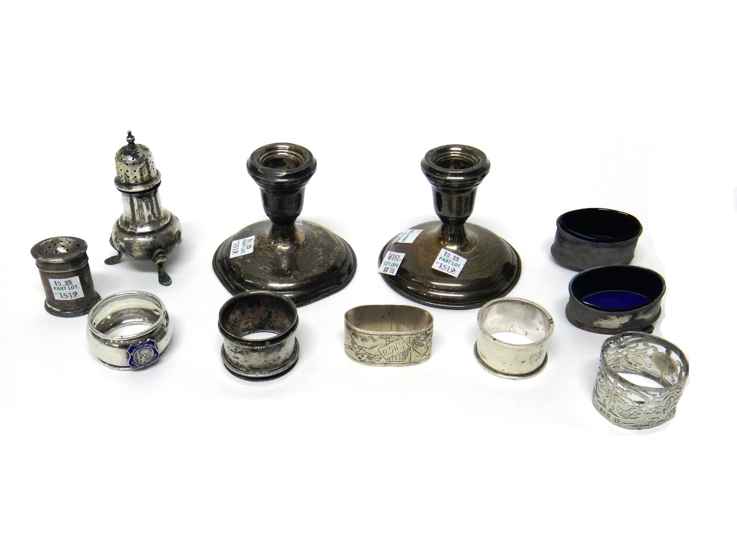 Appraisal: Silver comprising five napkin rings two pepperettes and two oval