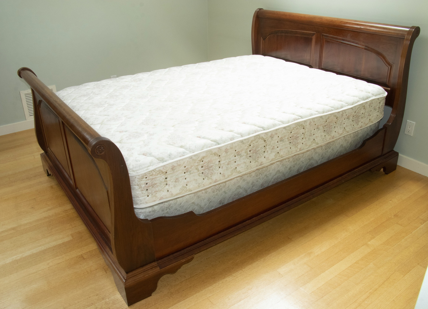 Appraisal: QUEEN-SIZE SLEIGH BED FRAME Queen-sized bedframe with scroll pilasters with