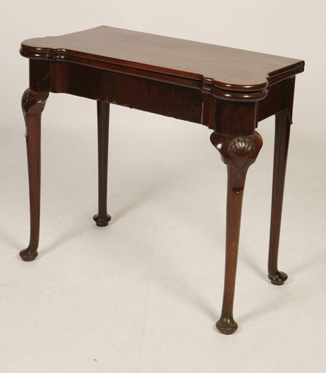 Appraisal: A GEORGE II MAHOGANY FOLD TOP TEA TABLE the rectangular