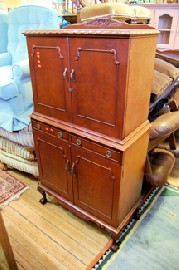 Appraisal: REPRODUCTION BALL AND CLAW FOOT MAHOGANY COCKTAIL CABINET