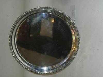 Appraisal: A WAITER Sheffield of circular form with moulded and gadrooned