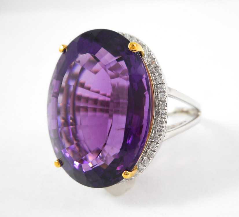 Appraisal: AMETHYST DIAMOND AND FOURTEEN KARAT GOLD RING The white gold