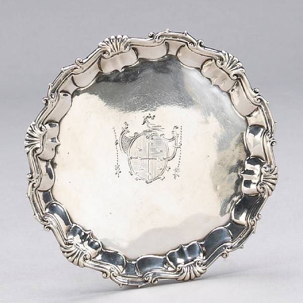 Appraisal: A George II silver salverWilliam amp Robert Peaston London With