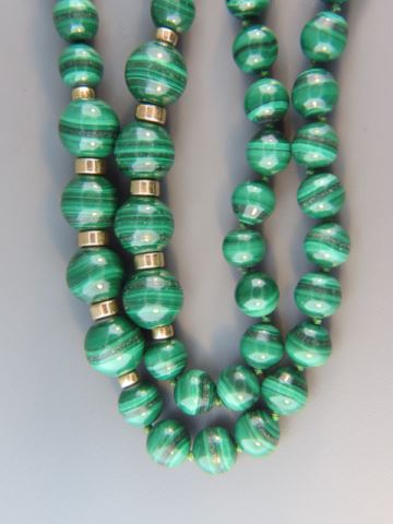 Appraisal: Malachite Necklace beads to mm long gold spacers highlighting the