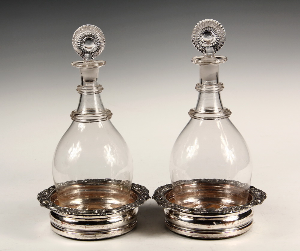 Appraisal: PAIR OF DECANTERS SHEFFIELD COASTERS - Late th c Blown