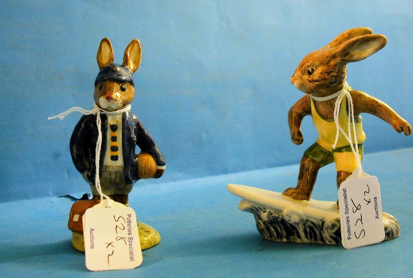 Appraisal: Royal Doulton Bunnykins Figures Schoolboy DB and Aussie Surfer boxed