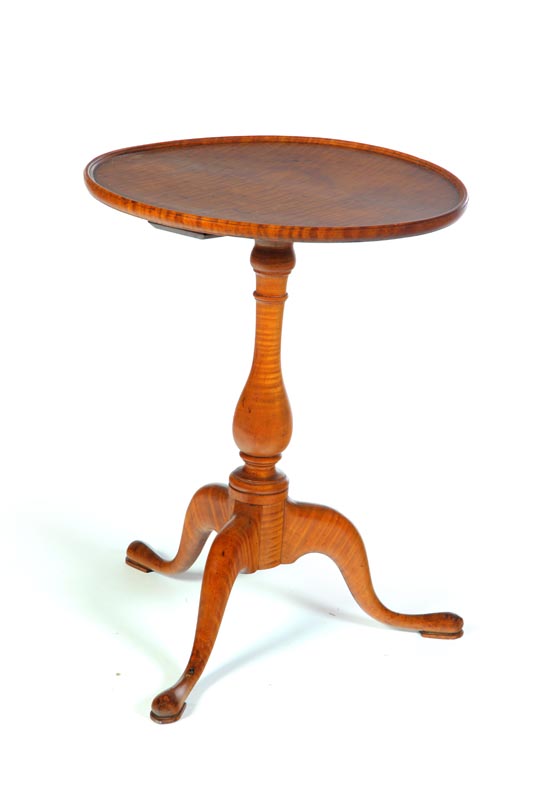 Appraisal: DISHTOP CANDLESTAND American late th century curly maple Tripod base