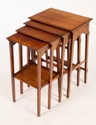 Appraisal: A nest of four mahogany tables the largest cm wide