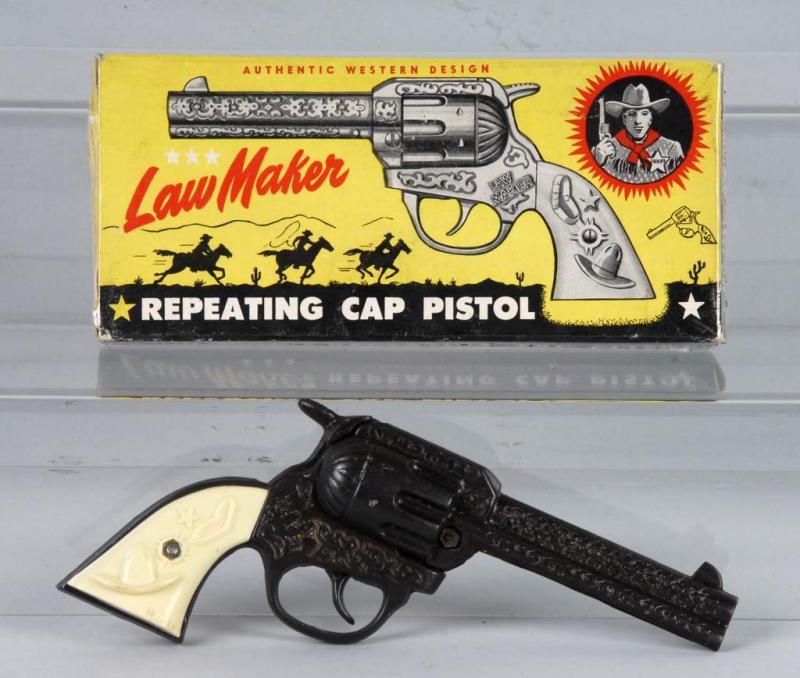 Appraisal: Cast Iron Kenton Lawmaker Cap Gun Description Wear on grips