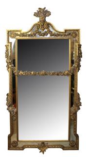 Appraisal: Italian Baroque gilt mirror with carved floral garland Italian th