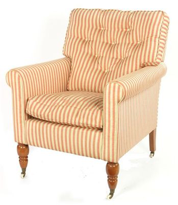 Appraisal: A modern easy armchair upholstered in a salmon pink and