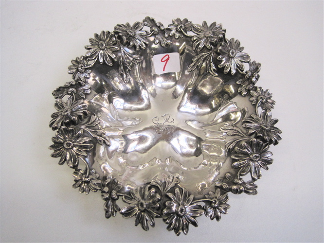 Appraisal: AN AMERICAN STERLING SILVER BOWL heavily chased and engraved with