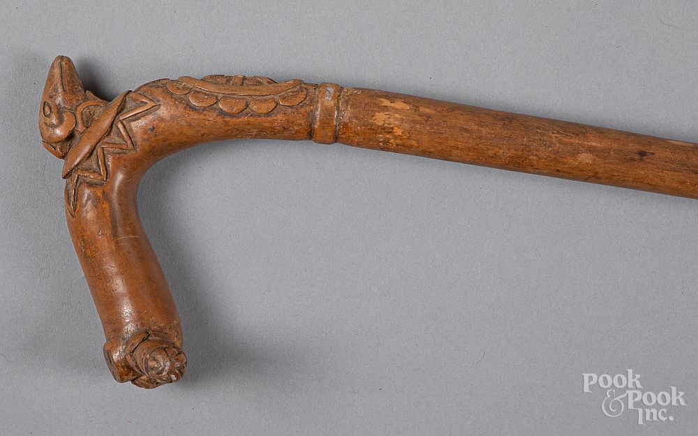 Appraisal: Carved cane ca Carved cane ca with sheep grip l