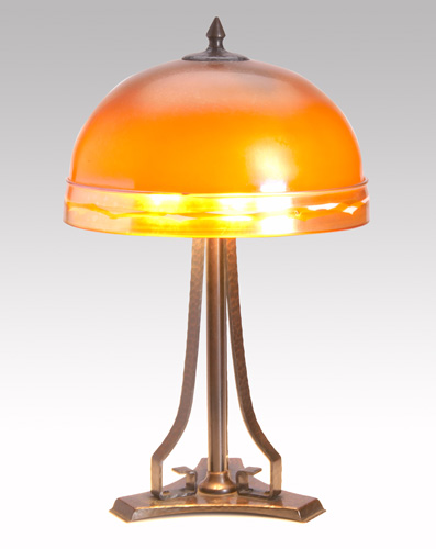 Appraisal: ROYCROFT STEUBEN Hammered copper and glass table lamp its hemispherical