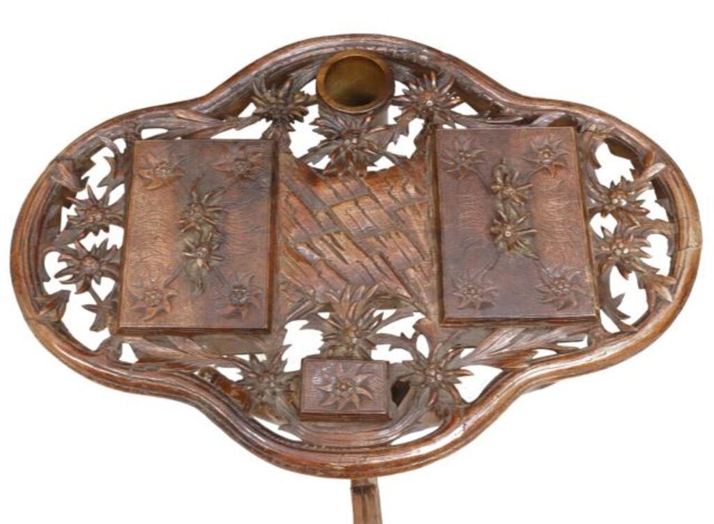 Appraisal: Black Forest walnut smoking stand late th c carved and