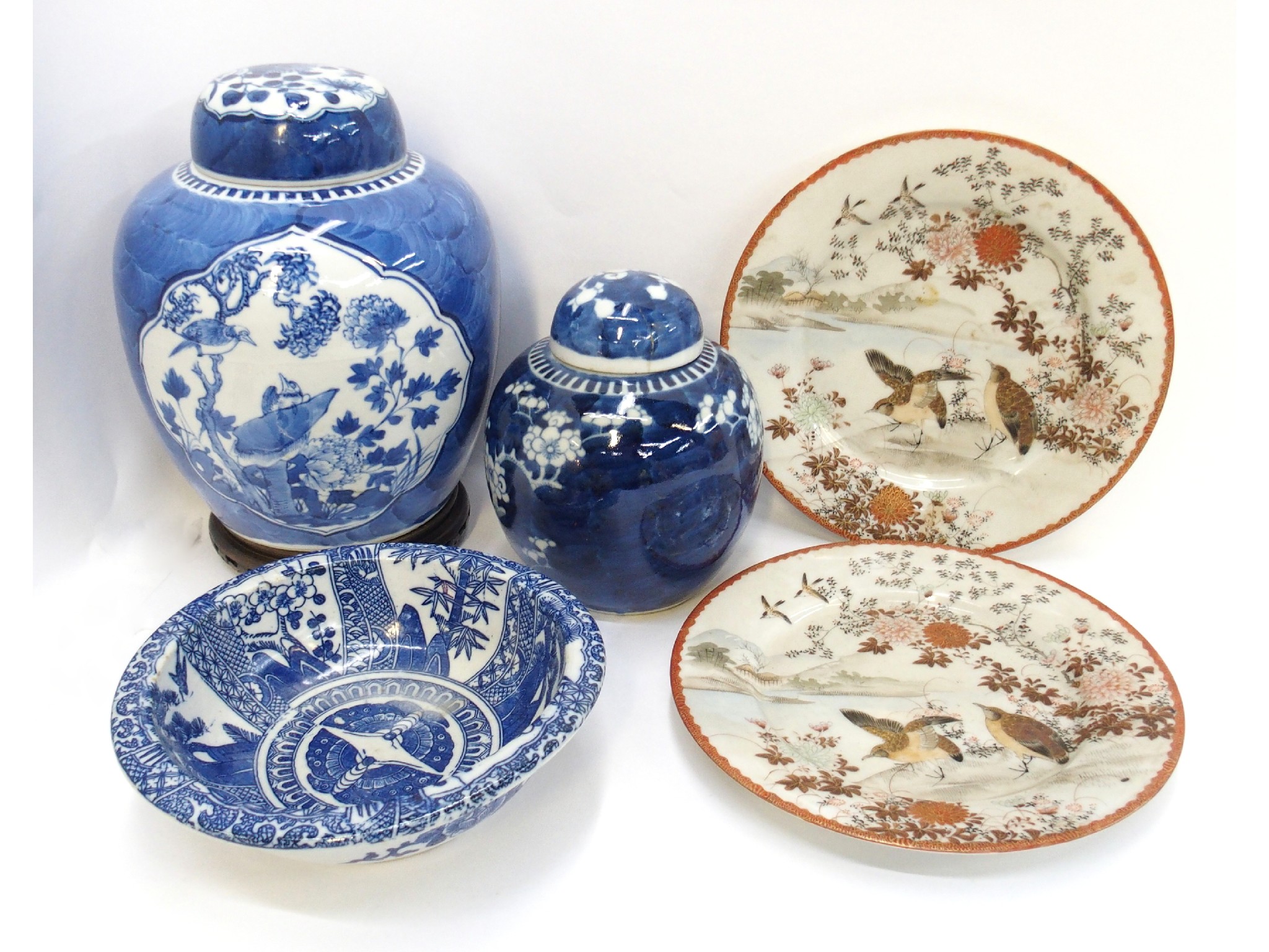 Appraisal: Two Chinese blue and white ginger jars and covers two