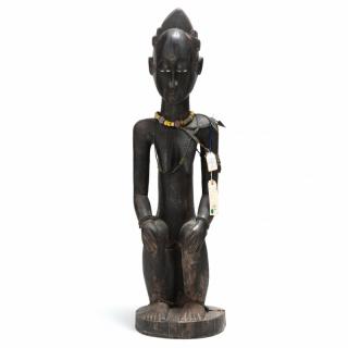 Appraisal: West African Seated Female Figure carved wood displaying extensive scarification