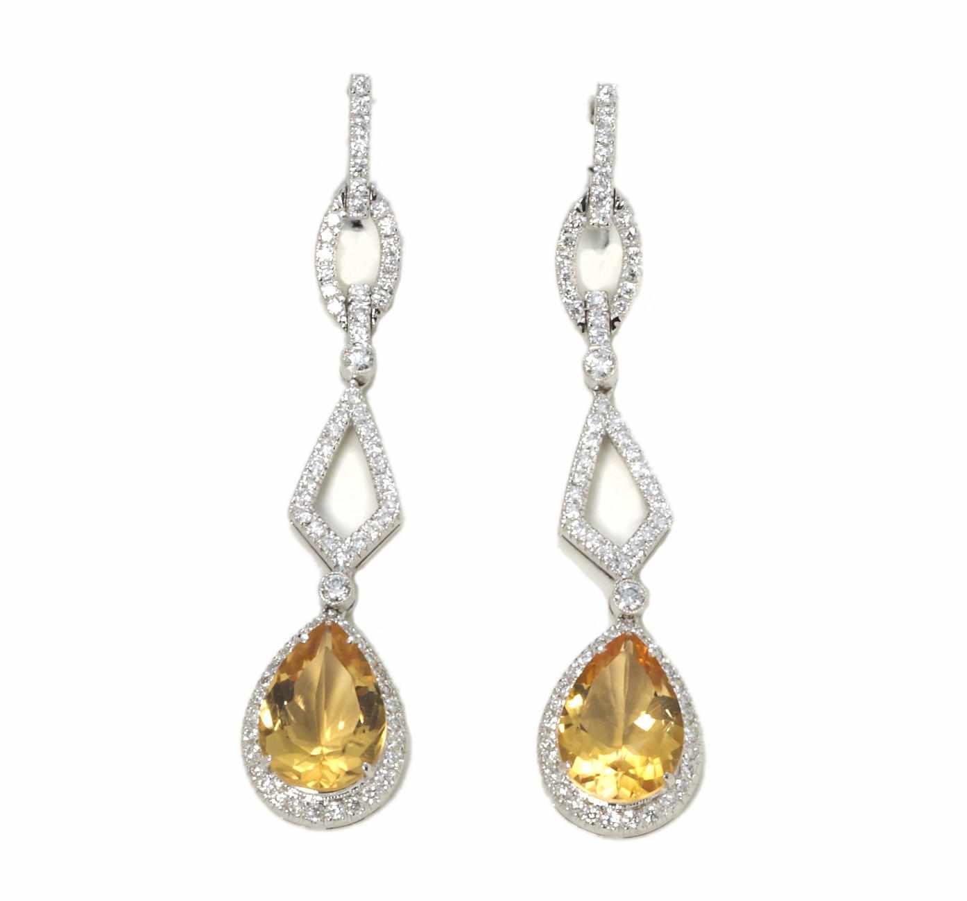 Appraisal: A pair of citrine and diamond pendant earrings Eli Frei