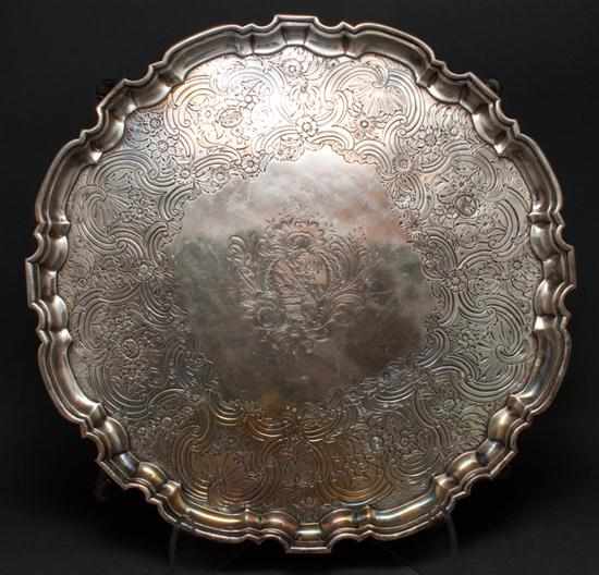 Appraisal: English chased sterling silver footed salver with hallmarks of John