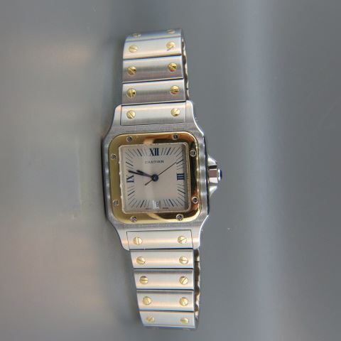 Appraisal: Cartier Gold Stainless Steel Wristwatch calendar model just serviced in