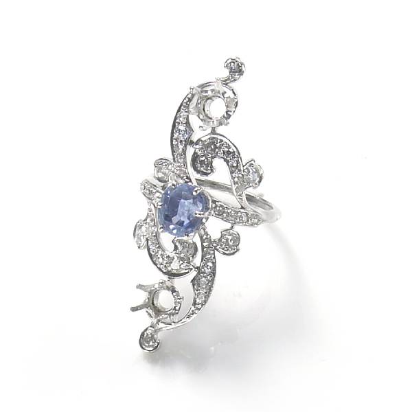 Appraisal: A sapphire diamond and platinum ring with two large stones