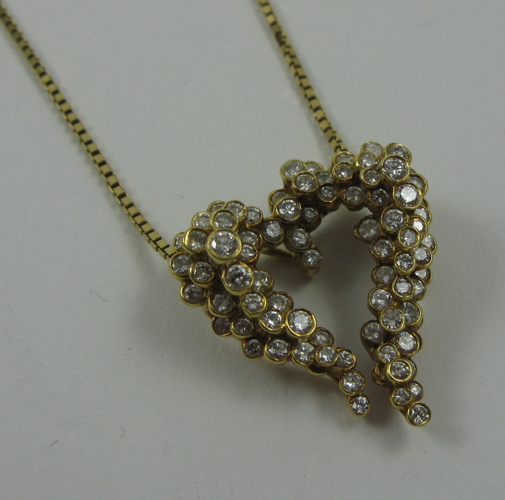 Appraisal: DIAMOND HEART PENDANT NECKLACE K yellow gold pendant and chain