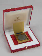 Appraisal: Must de Cartier A gilt metal travelling photograph frame signed