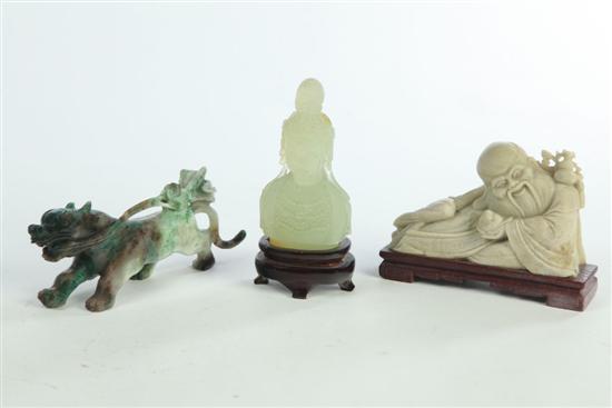 Appraisal: THREE STONE CARVINGS Asian th century Two soapstone carvings a