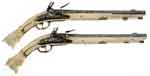 Appraisal: PAIR OF CARVED IVORY STOCKED FLINTLOCK PISTOLS NSN Cal This