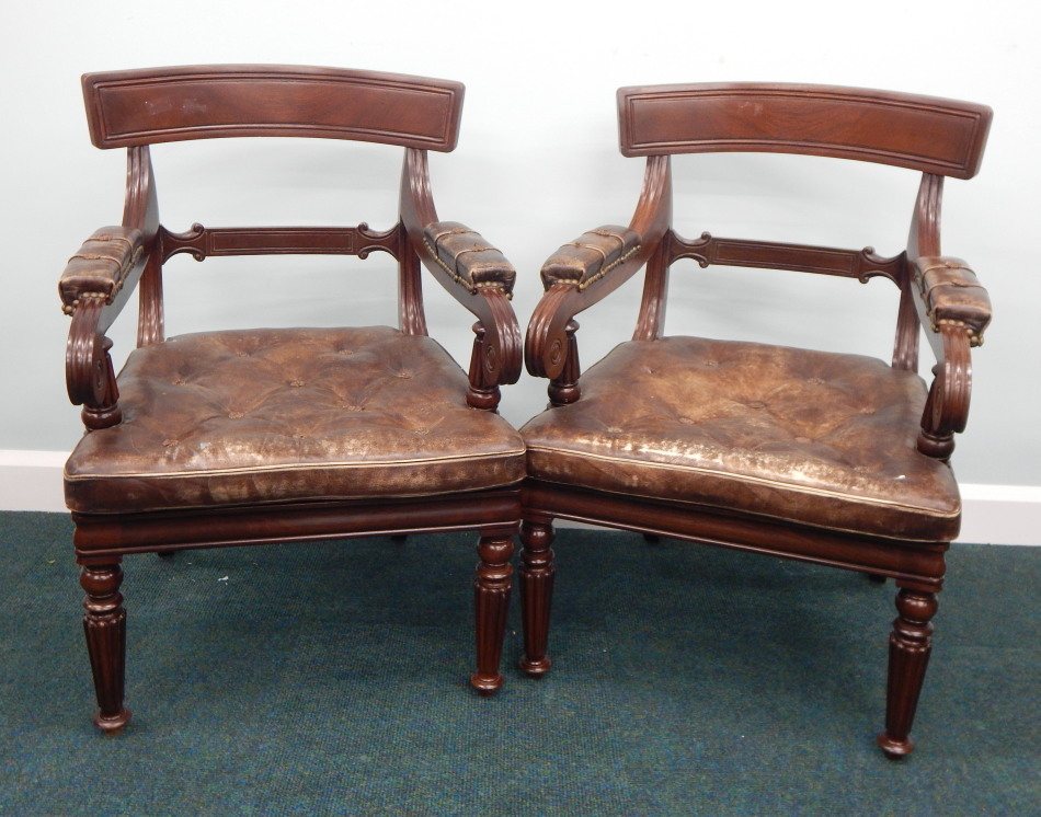 Appraisal: A pair of mahogany open armchairs in George IV style