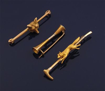 Appraisal: Three gold bar brooches One set with a gold fox