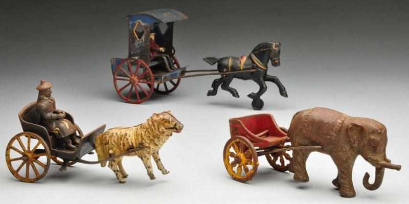 Appraisal: Lot of Cast Iron Animal-Drawn Cart Toys Description Includes one