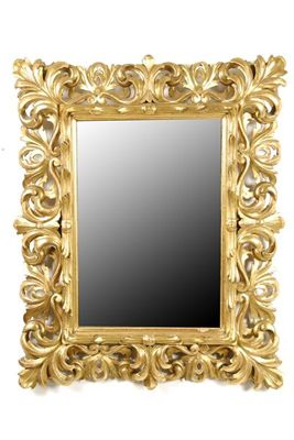 Appraisal: A carved giltwood Florentine wall mirror with a rectangular plate