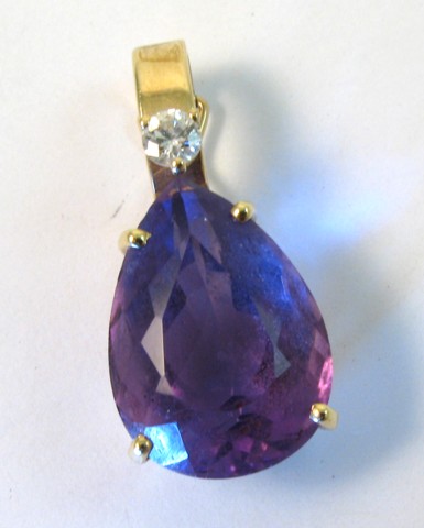 Appraisal: AMETHYST AND DIAMOND PENDANT k yellow gold and set with