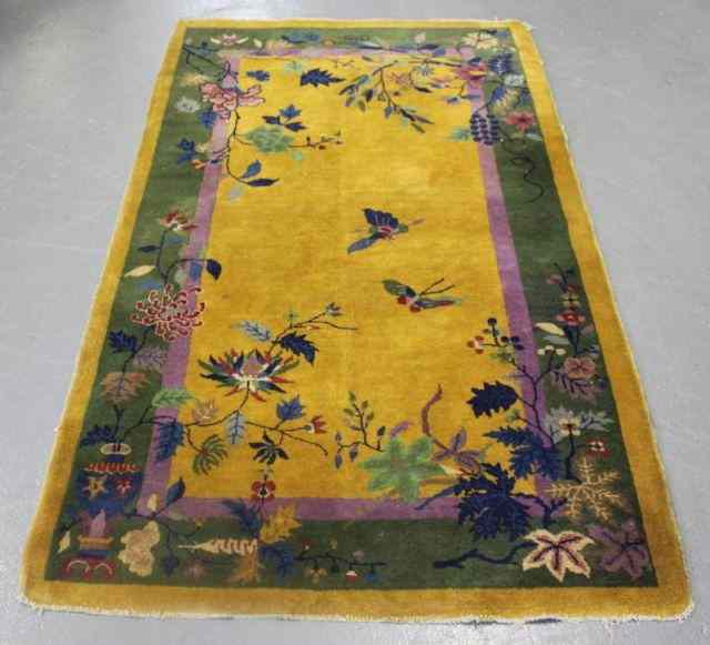 Appraisal: Art Deco Nichols Style Chinese Scatter Carpet With urn and