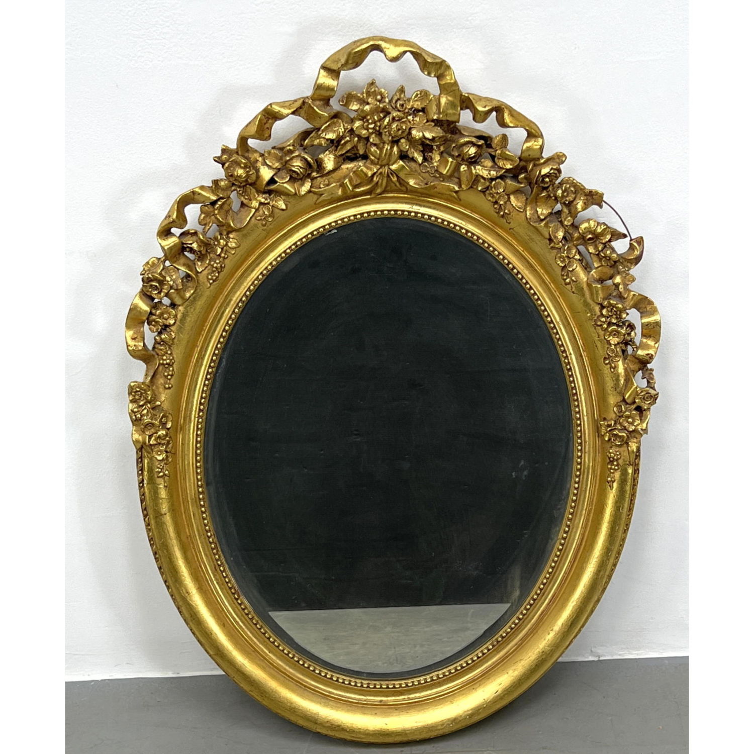 Appraisal: Decorative Floral Ribbon Gilt Oval Frame Mirror Dimensions H inches