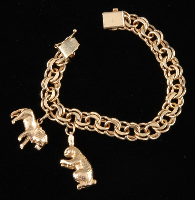 Appraisal: KY charm bracelet featuring animal charms grams total weight S