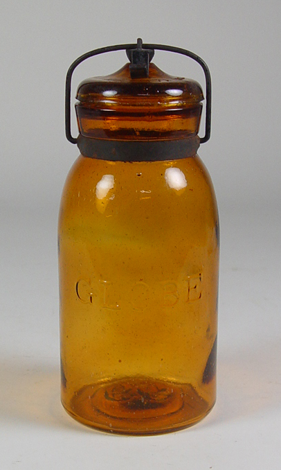 Appraisal: Amber Canning Jar Amber Globe jar with wire bail handle